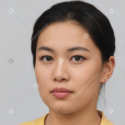 Neutral asian young-adult female with medium  brown hair and brown eyes