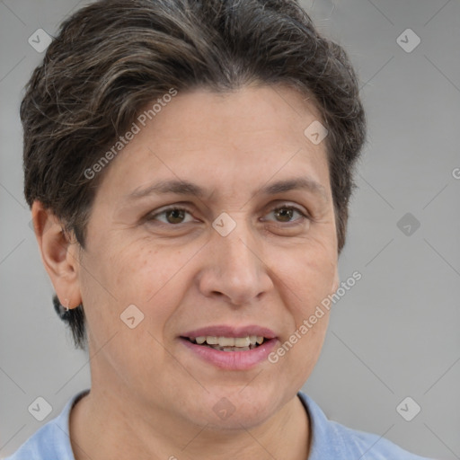 Joyful white adult female with short  brown hair and brown eyes