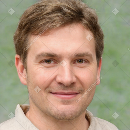 Joyful white adult male with short  brown hair and grey eyes