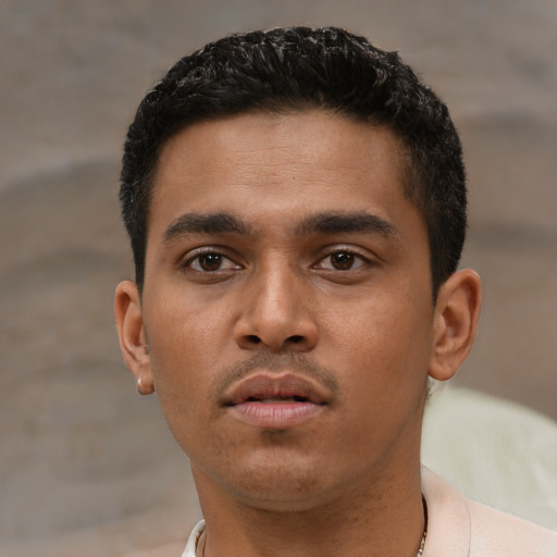 Neutral black young-adult male with short  brown hair and brown eyes