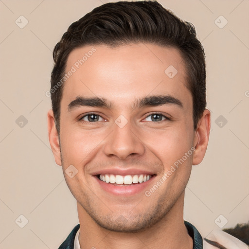 Joyful white young-adult male with short  brown hair and brown eyes