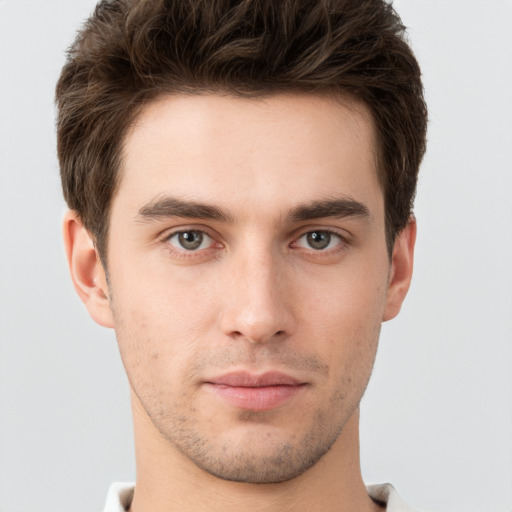 Neutral white young-adult male with short  brown hair and brown eyes