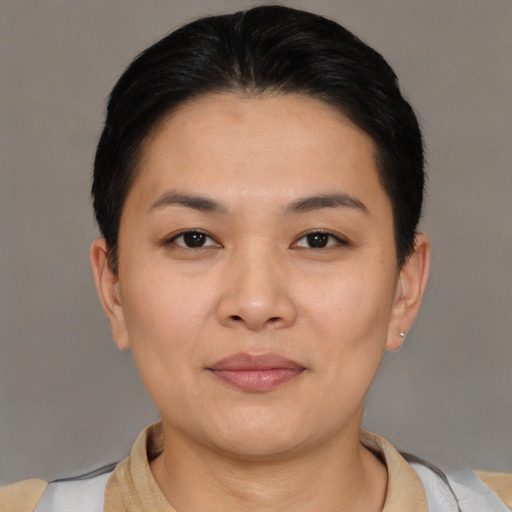 Neutral asian young-adult female with short  brown hair and brown eyes