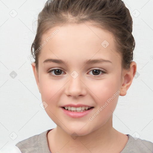 Joyful white child female with short  brown hair and brown eyes