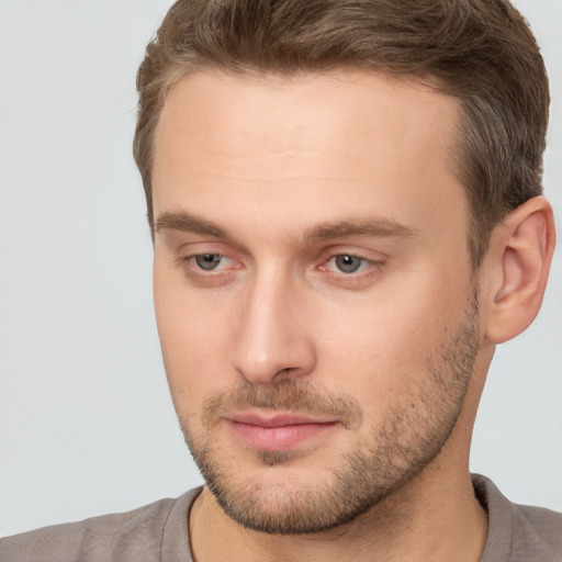 Neutral white young-adult male with short  brown hair and brown eyes