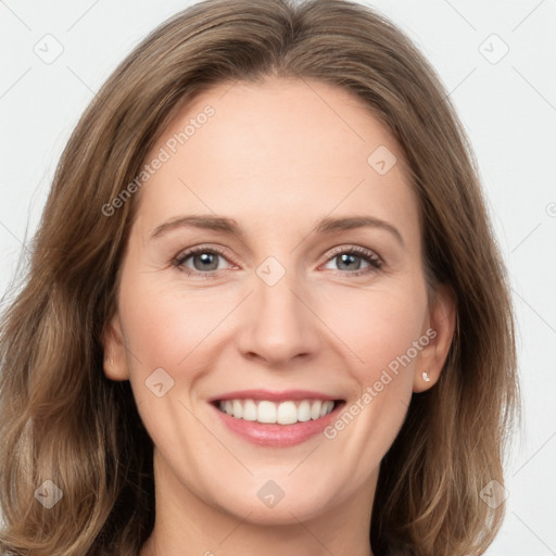 Joyful white young-adult female with long  brown hair and grey eyes