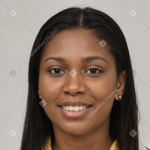 Joyful latino young-adult female with long  brown hair and brown eyes