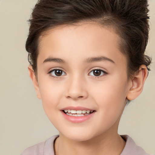 Joyful white child female with short  brown hair and brown eyes