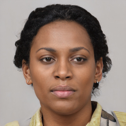 Neutral black young-adult female with short  black hair and brown eyes