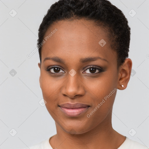 Joyful black young-adult female with short  brown hair and brown eyes