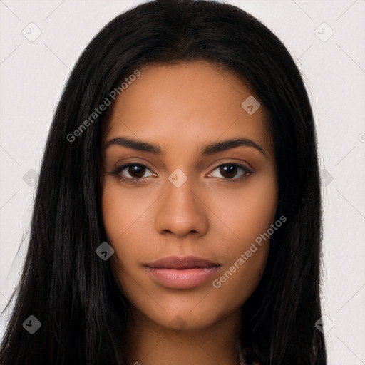 Neutral latino young-adult female with long  black hair and brown eyes