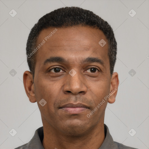 Neutral latino young-adult male with short  brown hair and brown eyes
