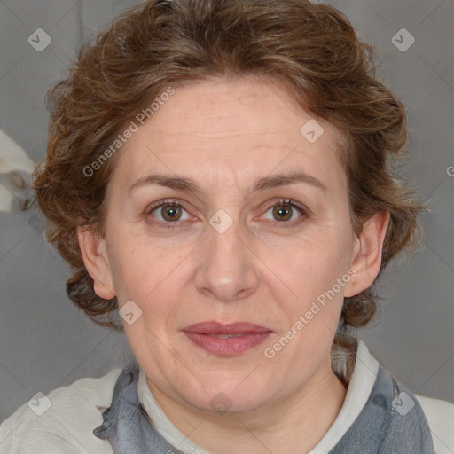 Joyful white adult female with medium  brown hair and blue eyes