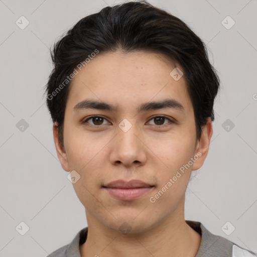 Joyful white young-adult male with short  black hair and brown eyes