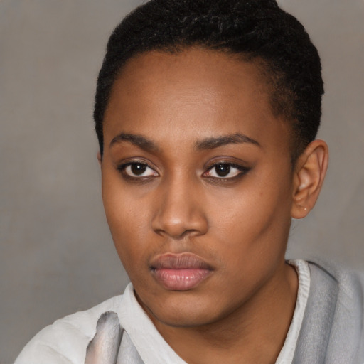 Neutral black young-adult female with short  black hair and brown eyes