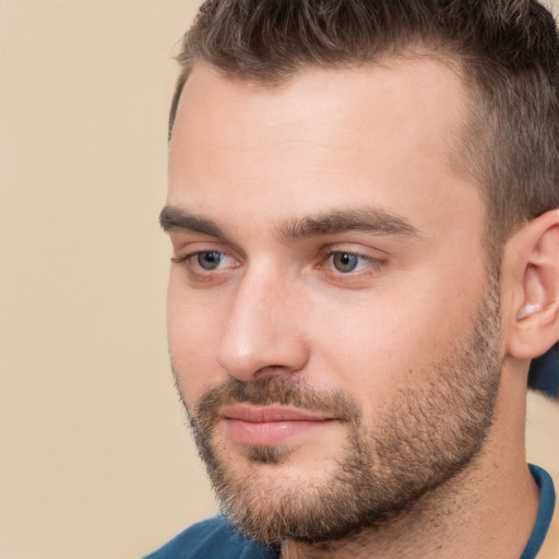 Neutral white young-adult male with short  brown hair and brown eyes