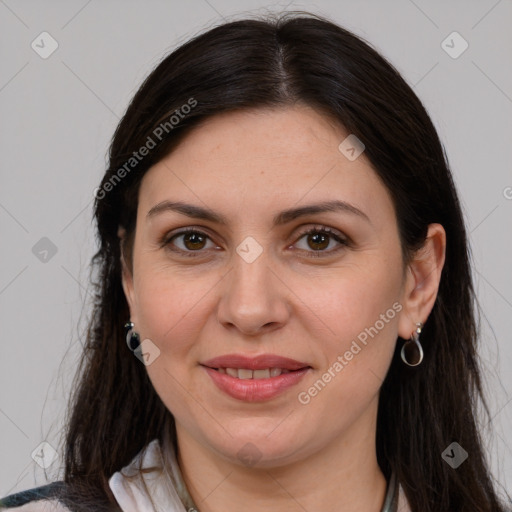 Joyful white adult female with medium  brown hair and grey eyes