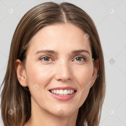 Joyful white young-adult female with long  brown hair and grey eyes