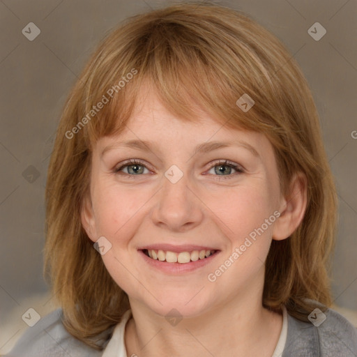 Joyful white young-adult female with medium  brown hair and blue eyes