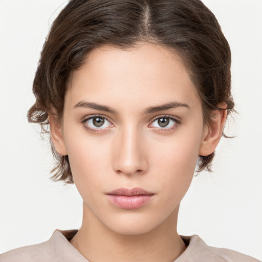 Neutral white young-adult female with medium  brown hair and brown eyes