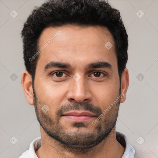 Neutral white young-adult male with short  black hair and brown eyes