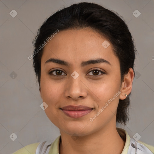 Joyful latino young-adult female with medium  brown hair and brown eyes