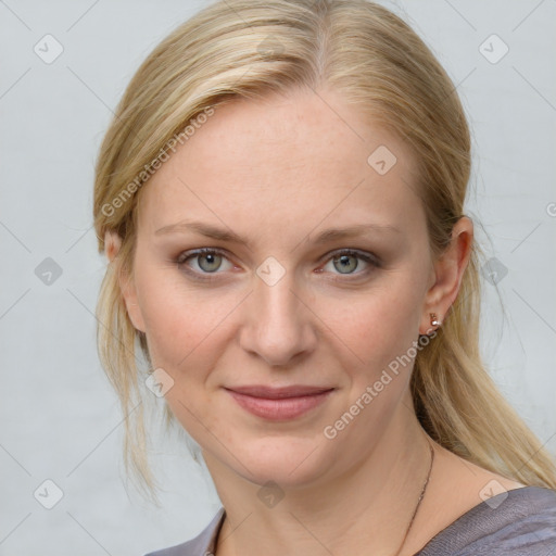 Joyful white young-adult female with medium  brown hair and blue eyes