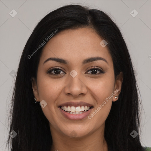 Joyful latino young-adult female with long  brown hair and brown eyes