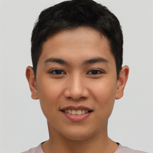 Joyful asian young-adult female with short  black hair and brown eyes