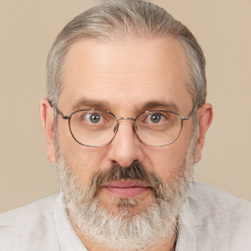 Neutral white middle-aged male with short  gray hair and brown eyes