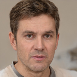 Neutral white adult male with short  brown hair and brown eyes