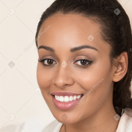 Joyful white young-adult female with long  brown hair and brown eyes