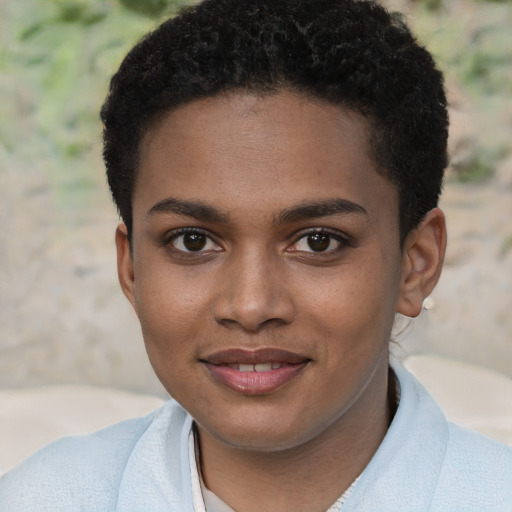 Joyful black young-adult female with short  brown hair and brown eyes