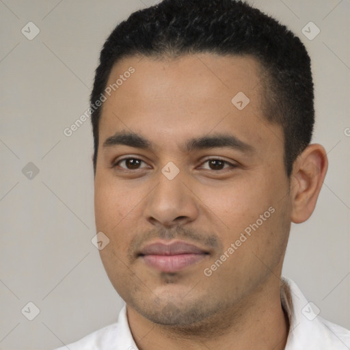 Neutral latino young-adult male with short  black hair and brown eyes