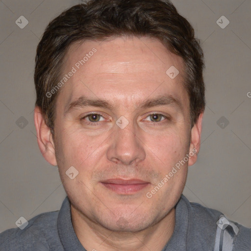 Joyful white adult male with short  brown hair and grey eyes