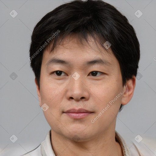 Neutral asian young-adult male with short  brown hair and brown eyes