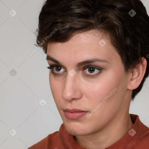 Neutral white young-adult female with medium  brown hair and brown eyes