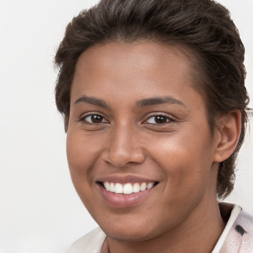 Joyful white young-adult female with short  brown hair and brown eyes