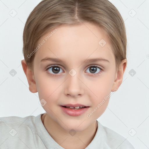 Joyful white child female with short  brown hair and brown eyes