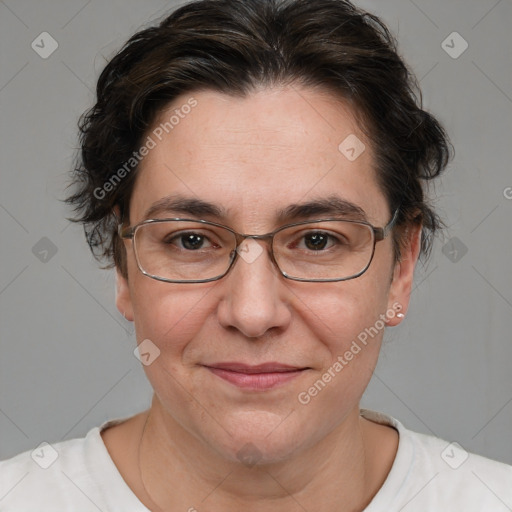 Joyful white adult female with short  brown hair and brown eyes