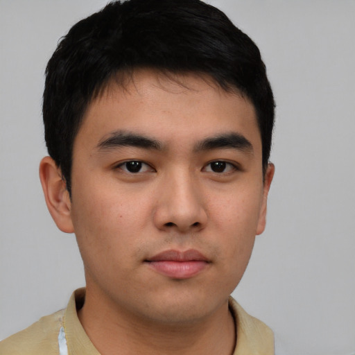 Neutral asian young-adult male with short  brown hair and brown eyes