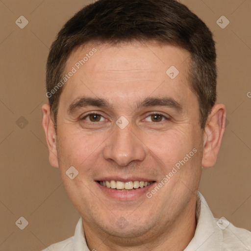 Joyful white adult male with short  brown hair and brown eyes