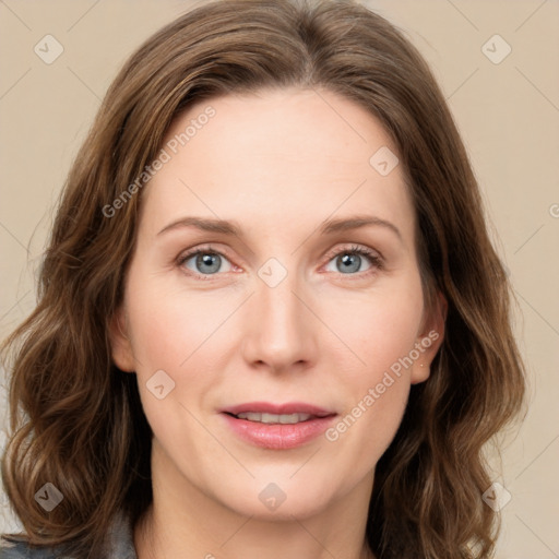 Joyful white young-adult female with medium  brown hair and green eyes