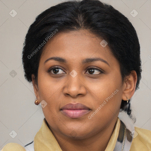 Joyful black young-adult female with medium  brown hair and brown eyes