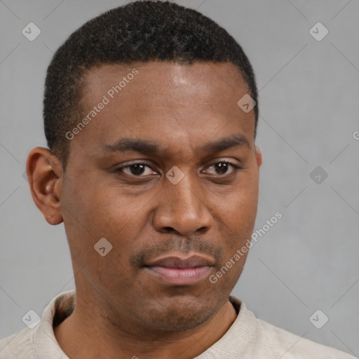 Neutral latino young-adult male with short  brown hair and brown eyes