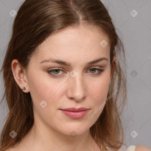 Joyful white young-adult female with medium  brown hair and blue eyes