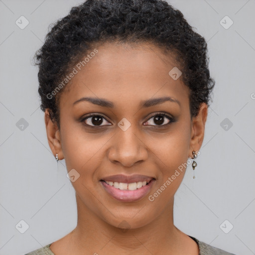 Joyful black young-adult female with short  brown hair and brown eyes