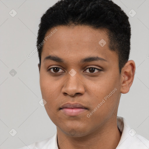 Neutral latino young-adult male with short  black hair and brown eyes