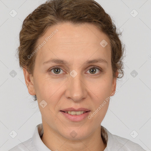 Joyful white adult female with short  brown hair and brown eyes