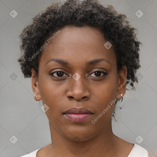 Neutral black young-adult female with short  brown hair and brown eyes